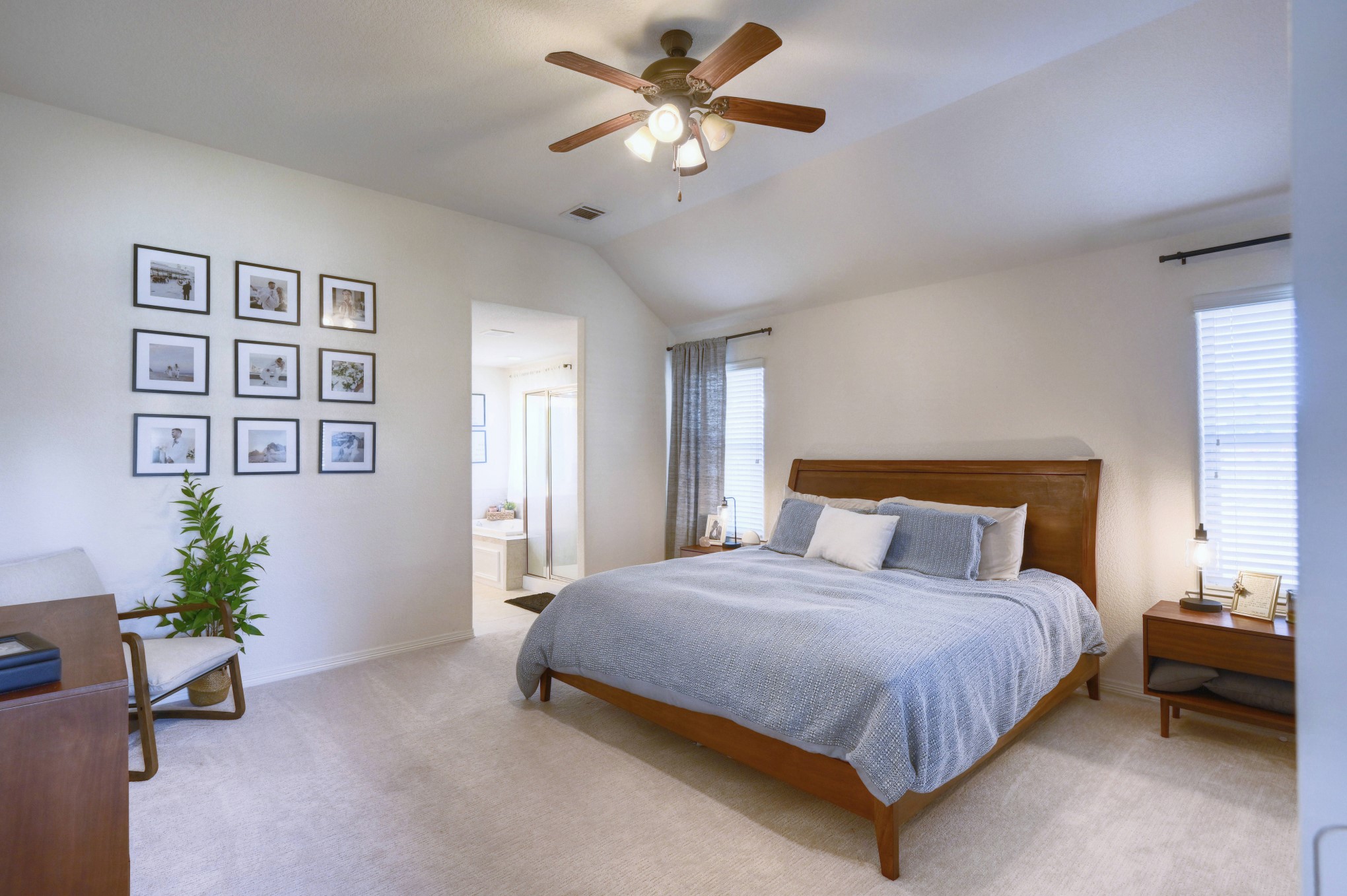 108 Cove Circle Conroe, TX 77356 - Photo 25 of 50 Step into serenity in this photo showcasing the primary bedroom space where new carpet has been installed.