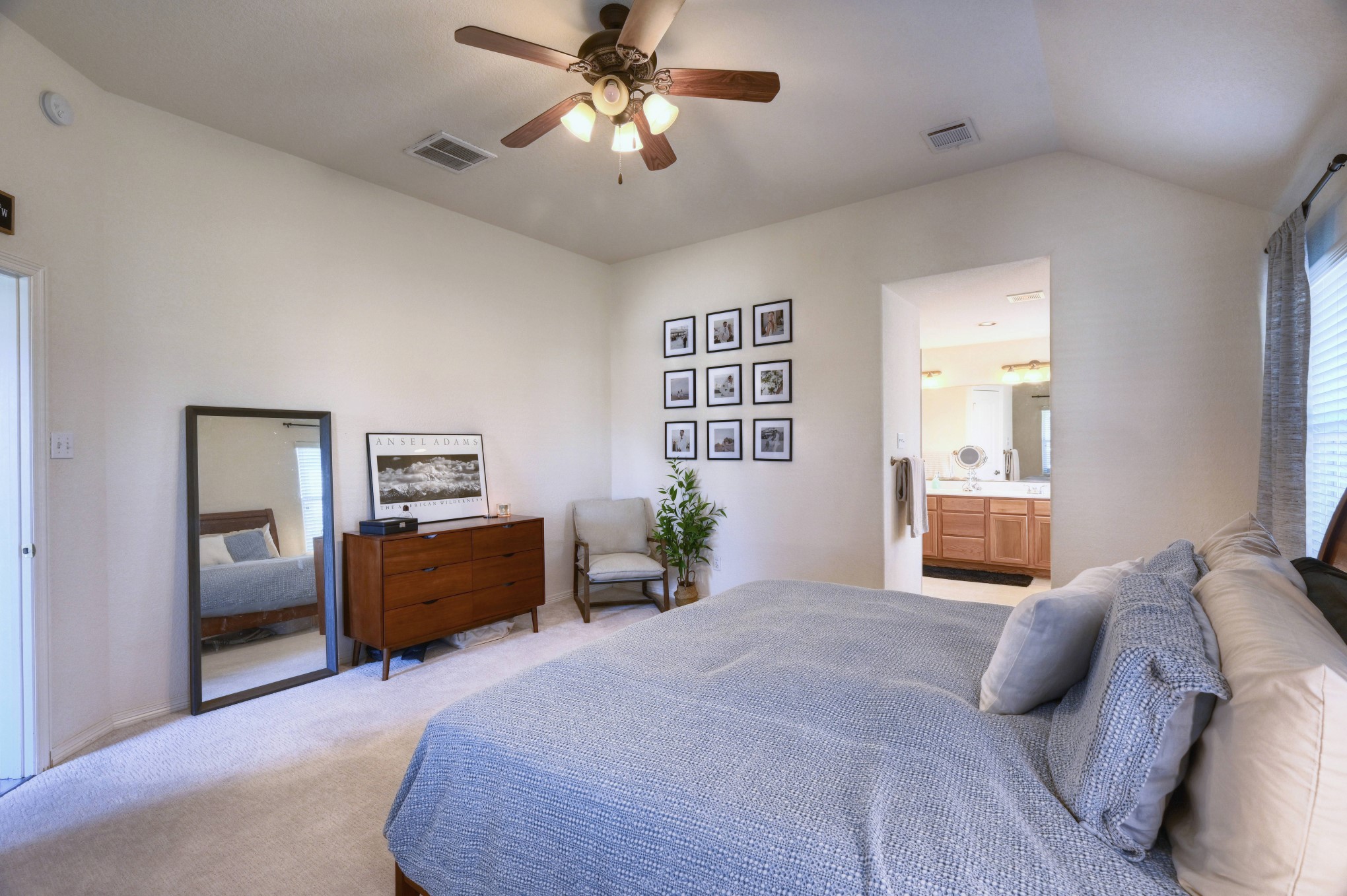 108 Cove Circle Conroe, TX 77356 - Photo 26 of 50 Designed for comfort and relaxation, this room welcomes you with its tranquil ambiance and thoughtful layout, providing a personal sanctuary within the home.