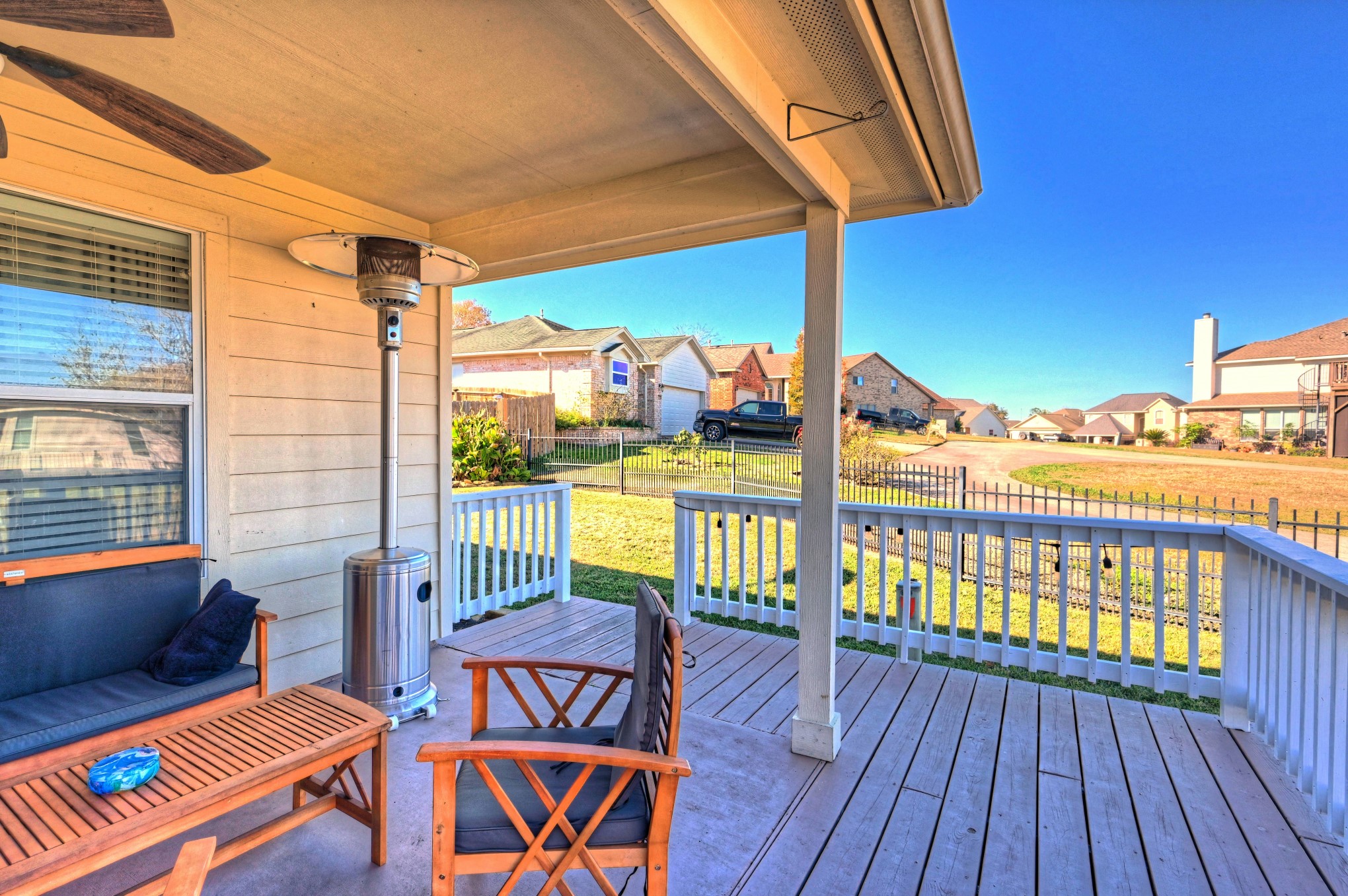 108 Cove Circle Conroe, TX 77356 - Photo 34 of 50 This outdoor haven invites you to unwind in shade and style, providing the perfect setting for al fresco gatherings and relaxation.