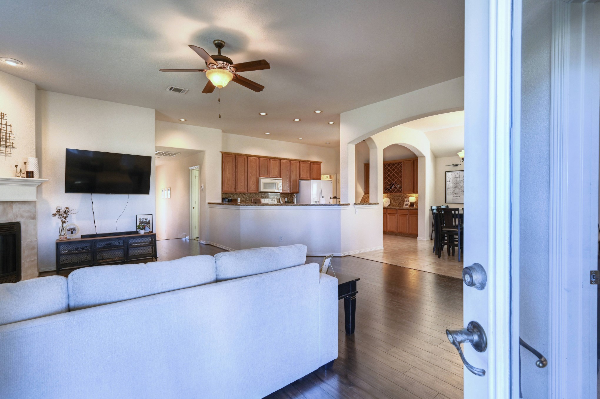 108 Cove Circle Conroe, TX 77356 - Photo 39 of 50 This transition captures the essence of a well-connected living space, where the outdoors seamlessly melds with the comfort of indoor living.