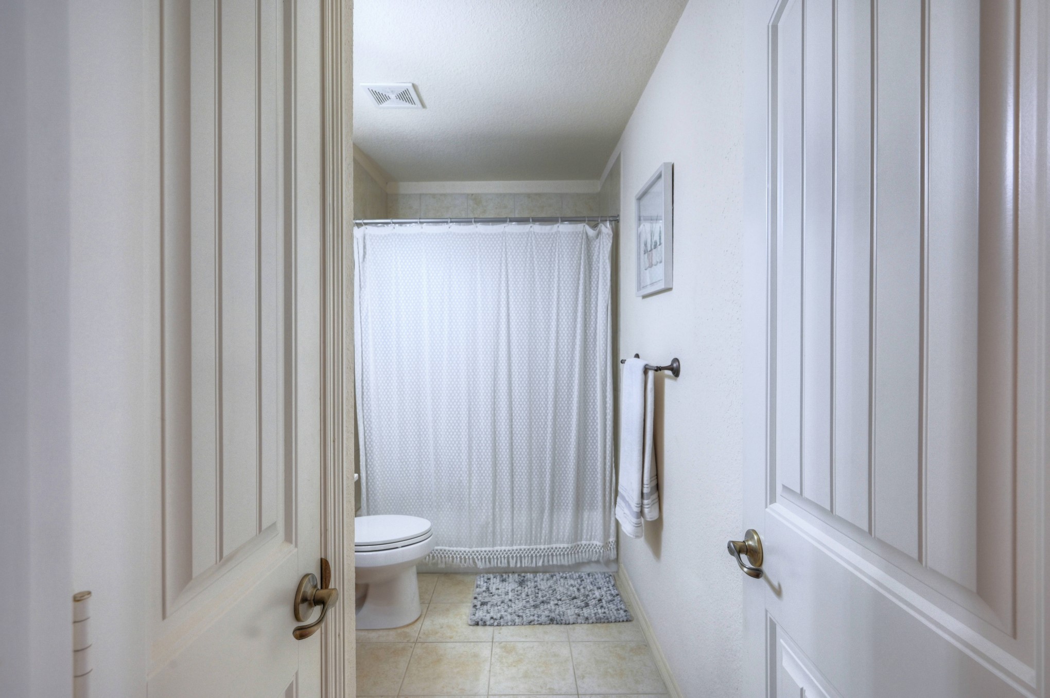 108 Cove Circle Conroe, TX 77356 - Photo 41 of 50 Off the welcoming front hallway, discover the convenience of the secondary bathroom in this photo.