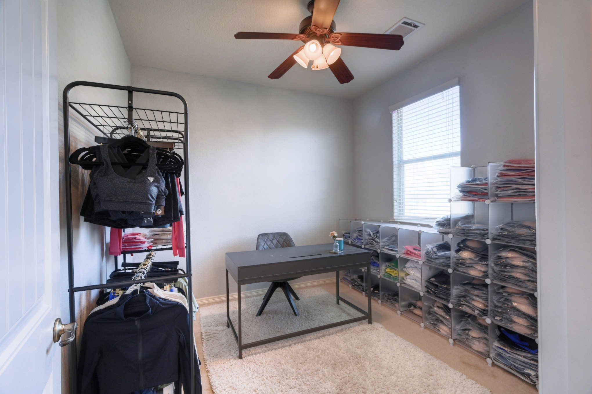108 Cove Circle Conroe, TX 77356 - Photo 7 of 50 Enjoy the perfect blend of work and relaxation in this secondary bedroom currently being used as a home office.