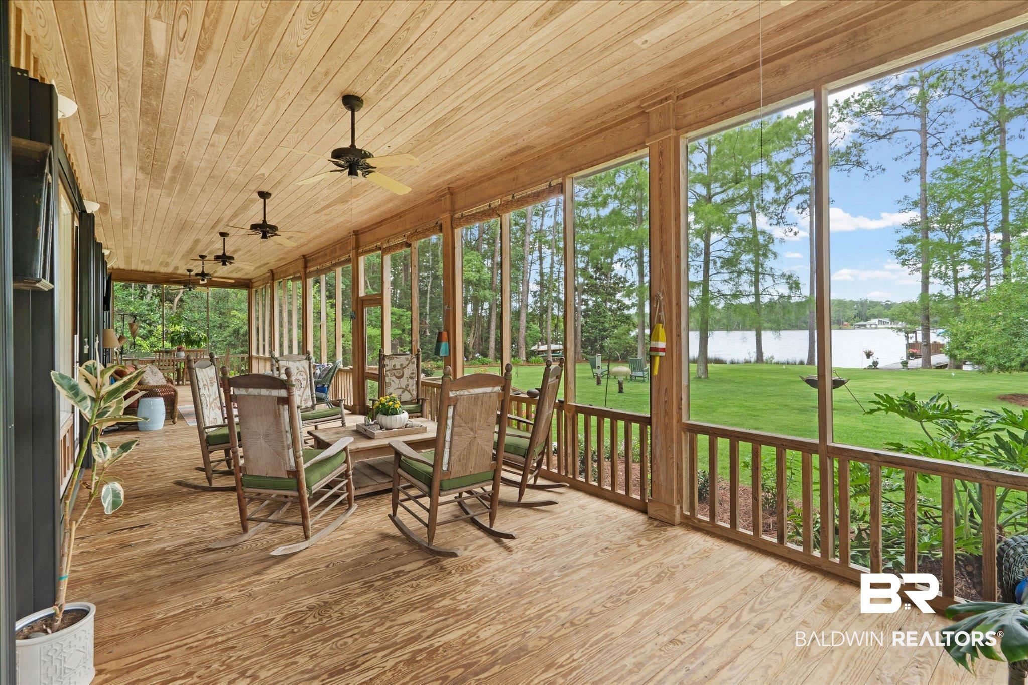 8841 Escambia Avenue Elberta, AL 36530 - Photo 23 of 66 Featuring the outdoor living and the views of the water.