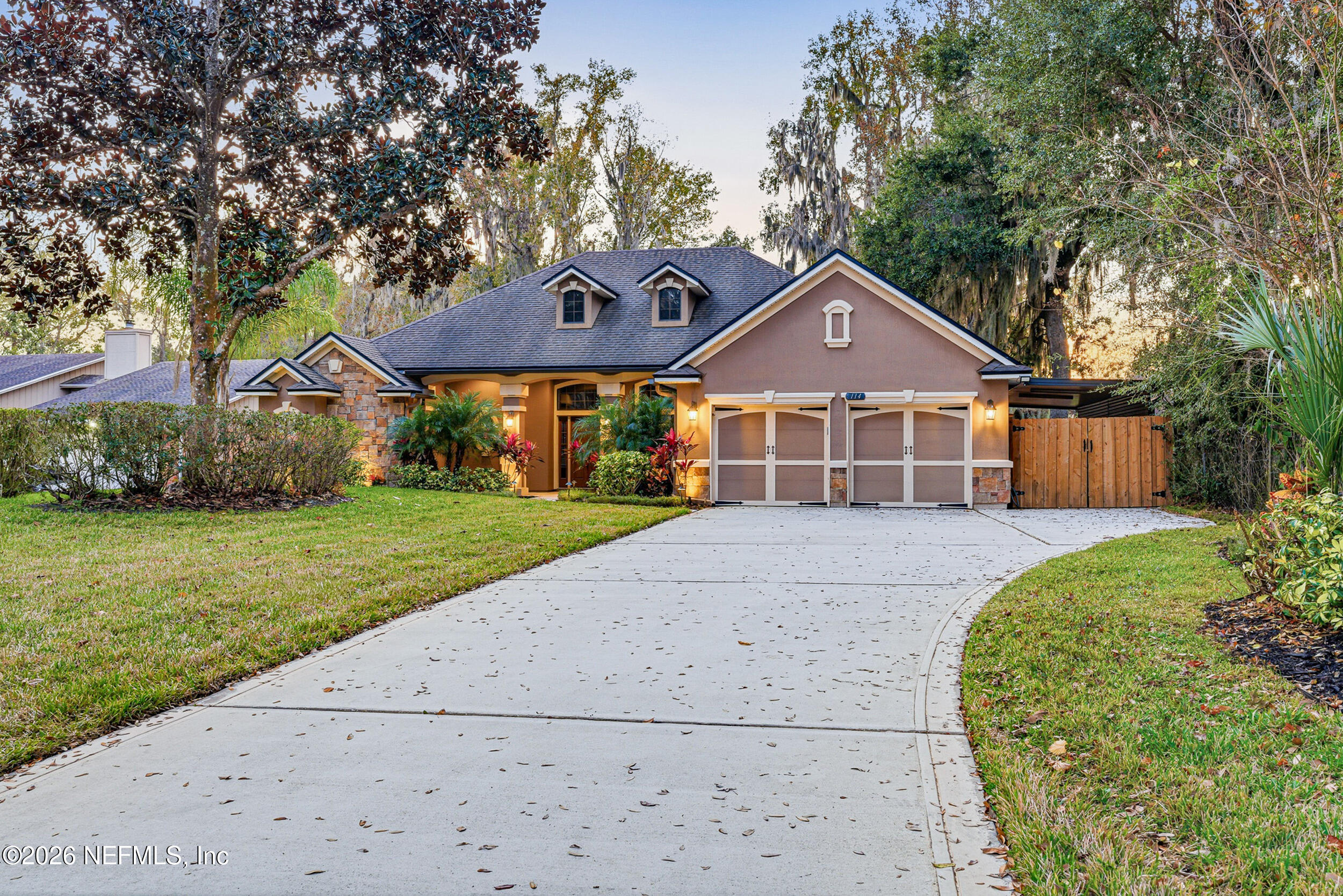 114 Warren Circle St. Johns, FL 32259 - Photo 1 of 32 a front view of a house with a yard