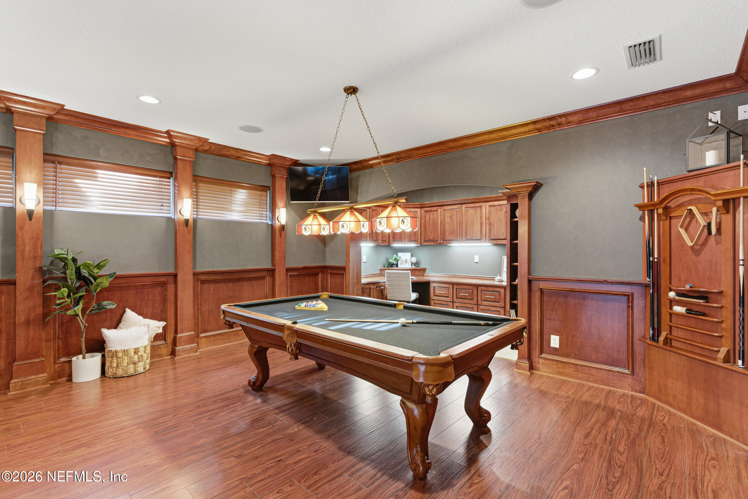 114 Warren Circle St. Johns, FL 32259 - Photo 11 of 32 a room with wooden floor pool table and windows
