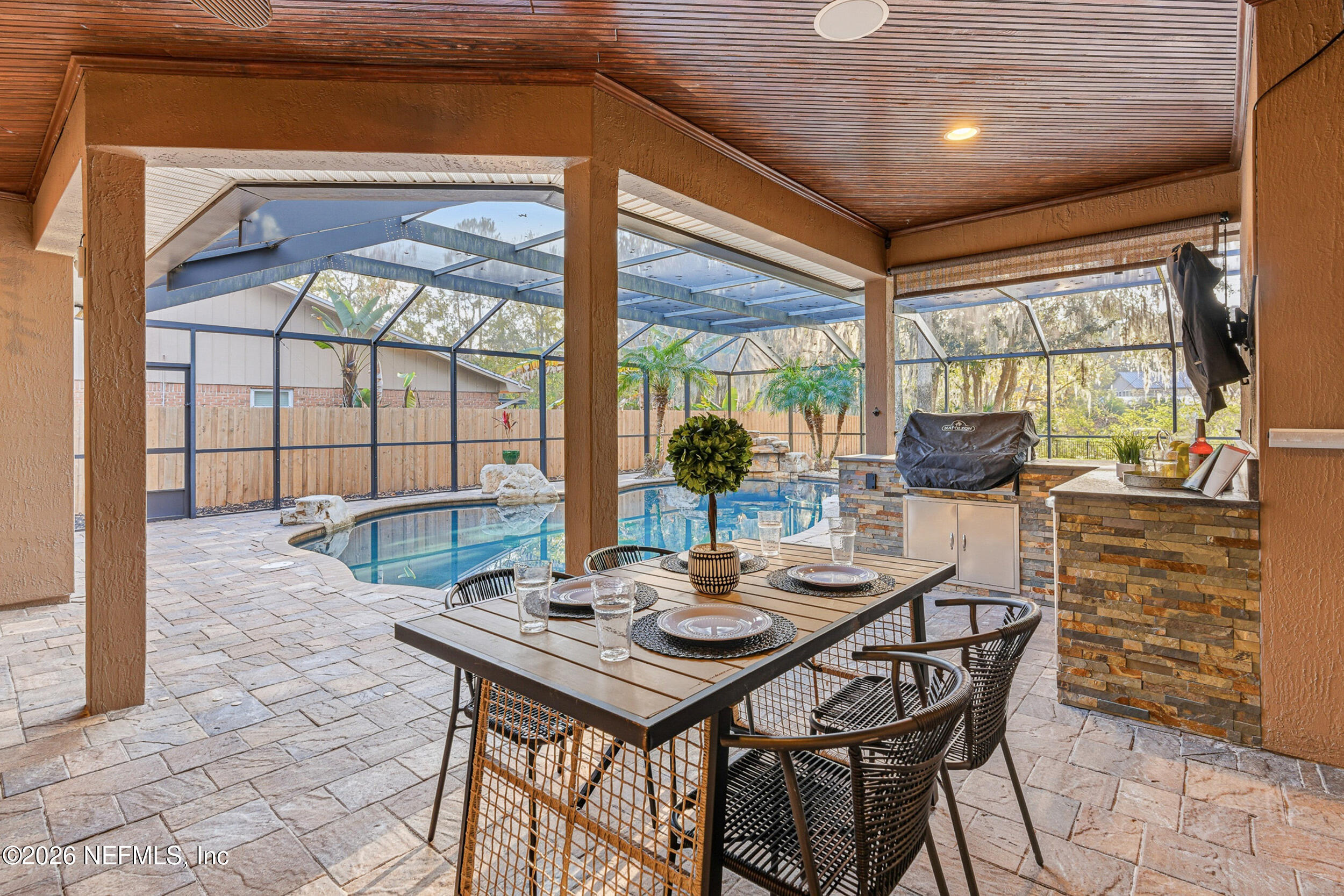 114 Warren Circle St. Johns, FL 32259 - Photo 25 of 32 a view of a dining table and chairs in the balcony