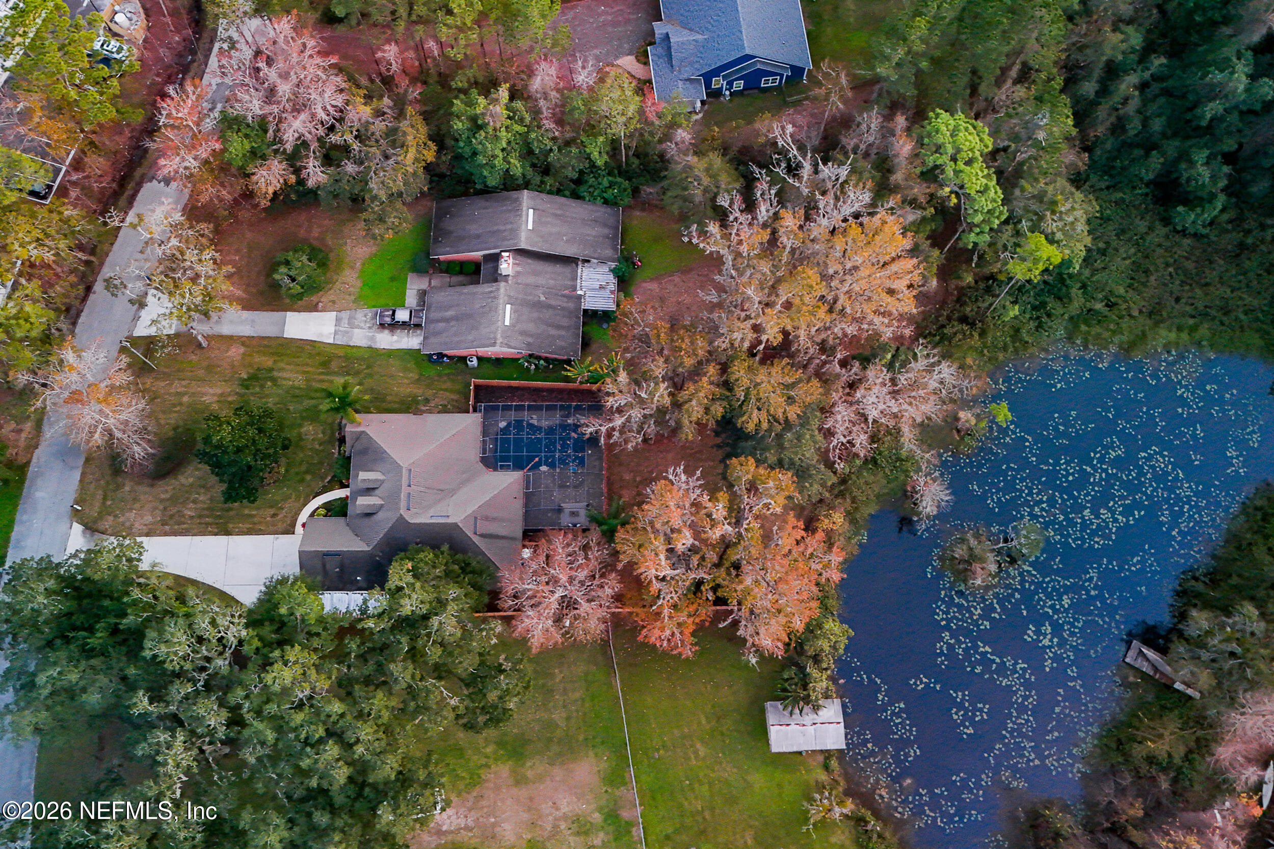 114 Warren Circle St. Johns, FL 32259 - Photo 30 of 32 an aerial view of a house with a yard