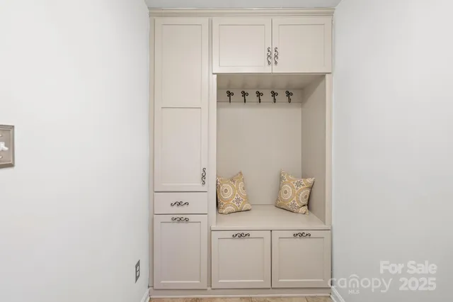 a utility room with sink dryer and washer