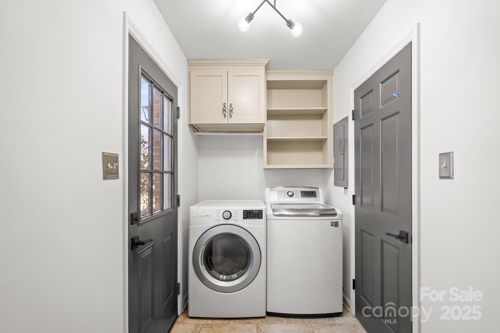 9211 Joyce Kilmer Drive Charlotte, NC 28213 - Photo 19 of 38 a utility room with sink dryer and washer