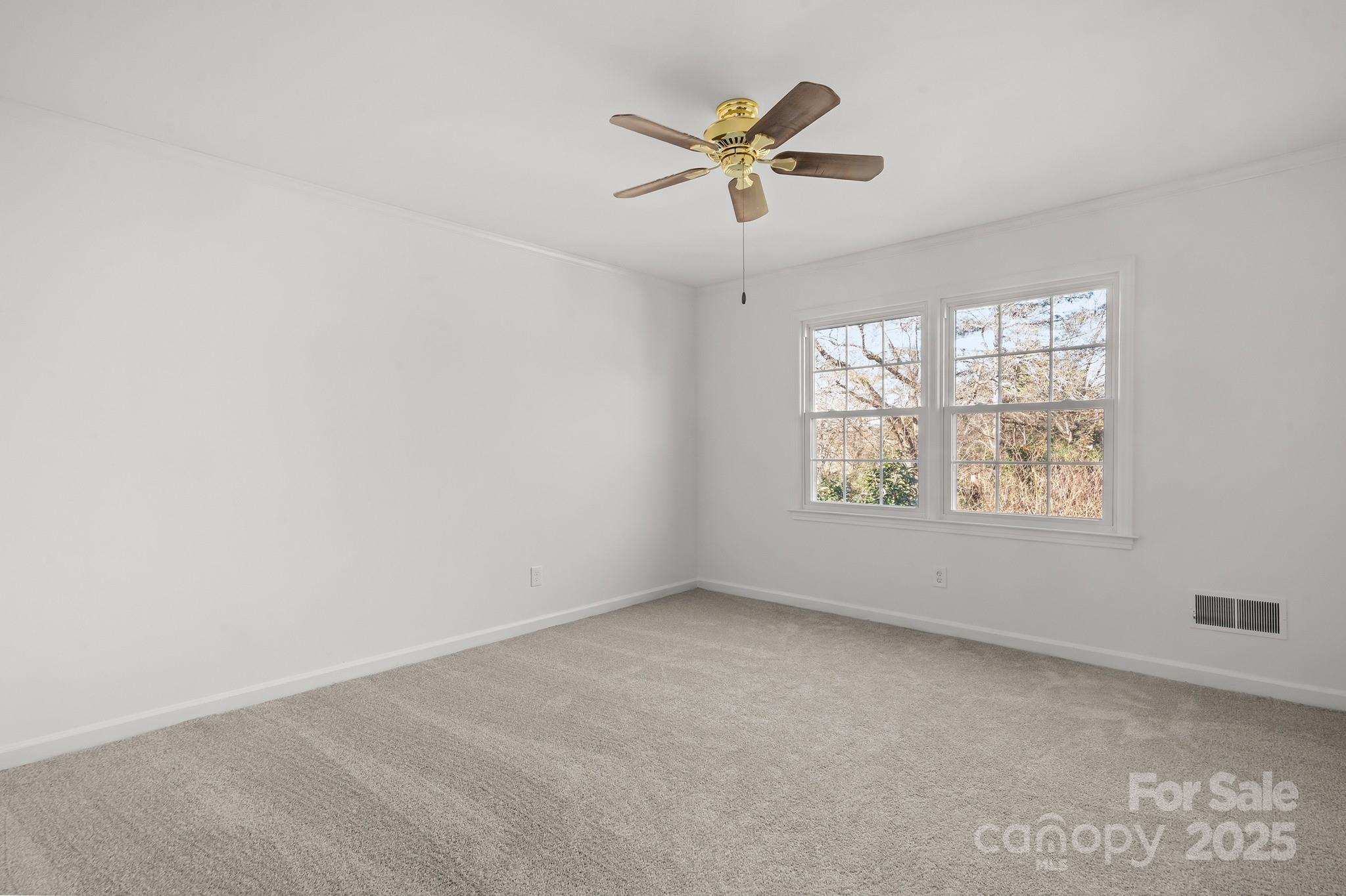 9211 Joyce Kilmer Drive Charlotte, NC 28213 - Photo 20 of 38 an empty room with window and windows