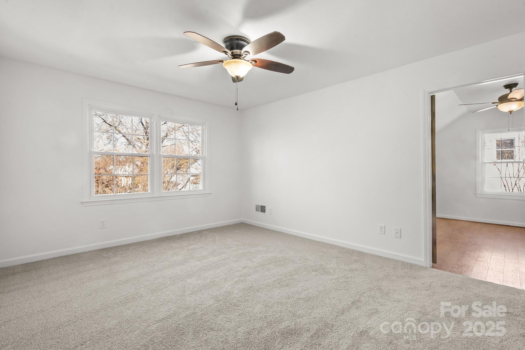 9211 Joyce Kilmer Drive Charlotte, NC 28213 - Photo 21 of 38 a view of an empty room with a window