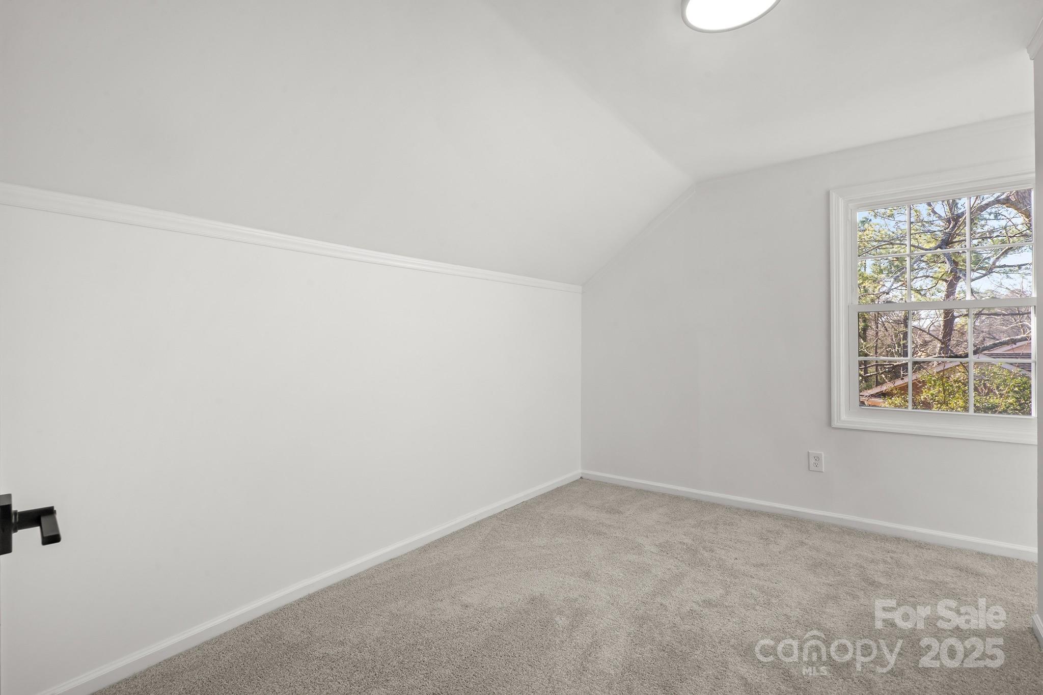 9211 Joyce Kilmer Drive Charlotte, NC 28213 - Photo 24 of 38 an empty room with windows