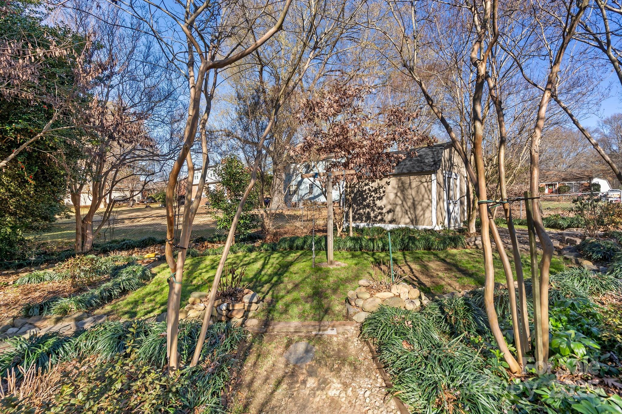 9211 Joyce Kilmer Drive Charlotte, NC 28213 - Photo 29 of 38 a view of yard with green space