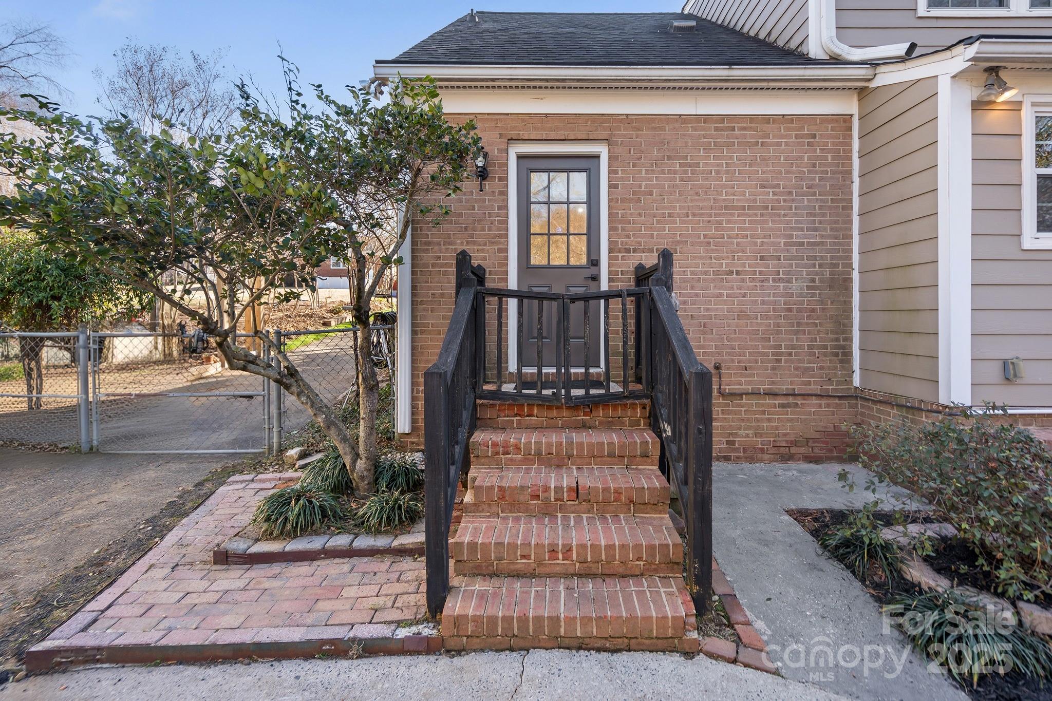 9211 Joyce Kilmer Drive Charlotte, NC 28213 - Photo 31 of 38 a view of outdoor space deck and tree