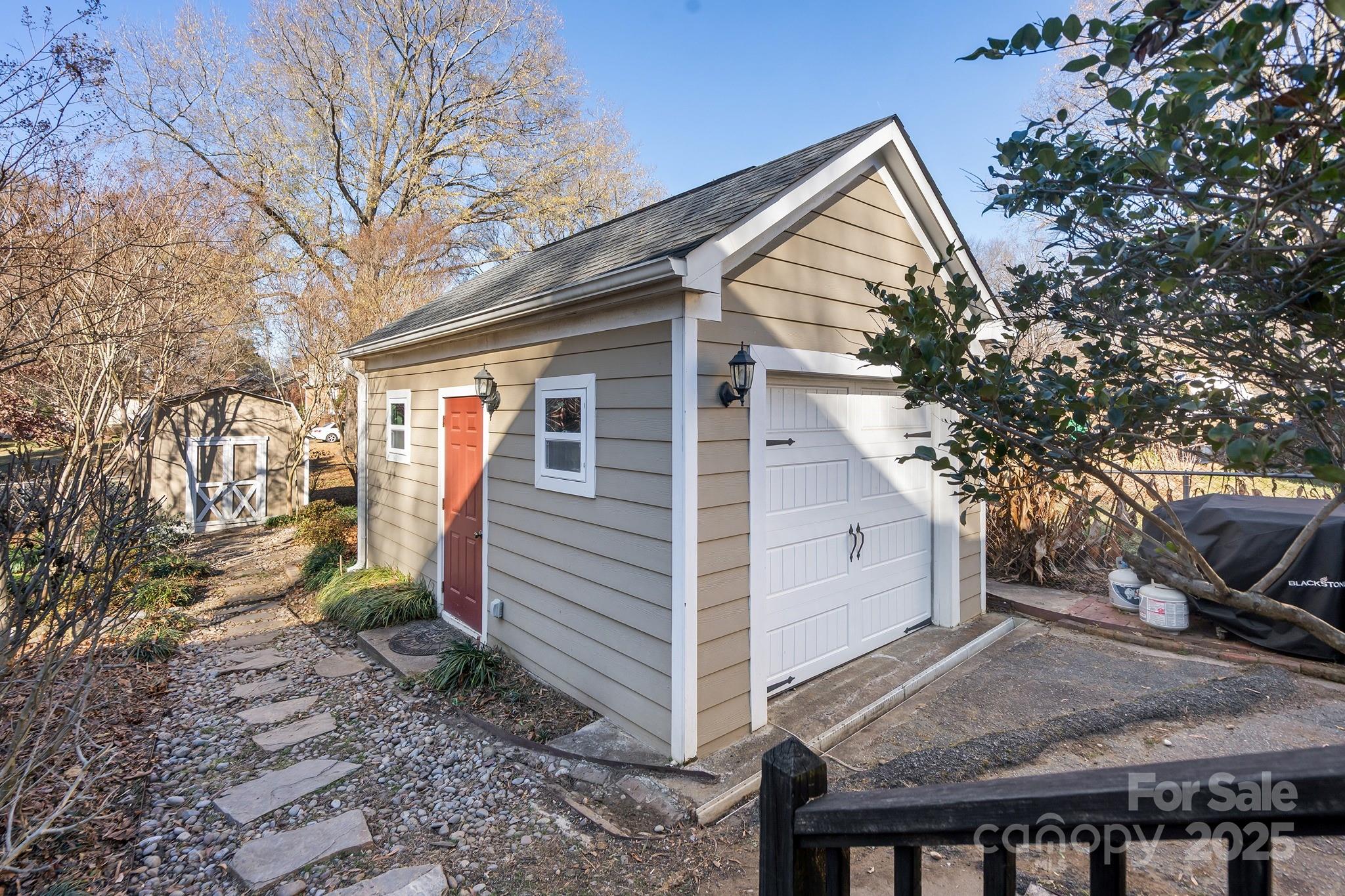 9211 Joyce Kilmer Drive Charlotte, NC 28213 - Photo 32 of 38 a view of a house with a yard