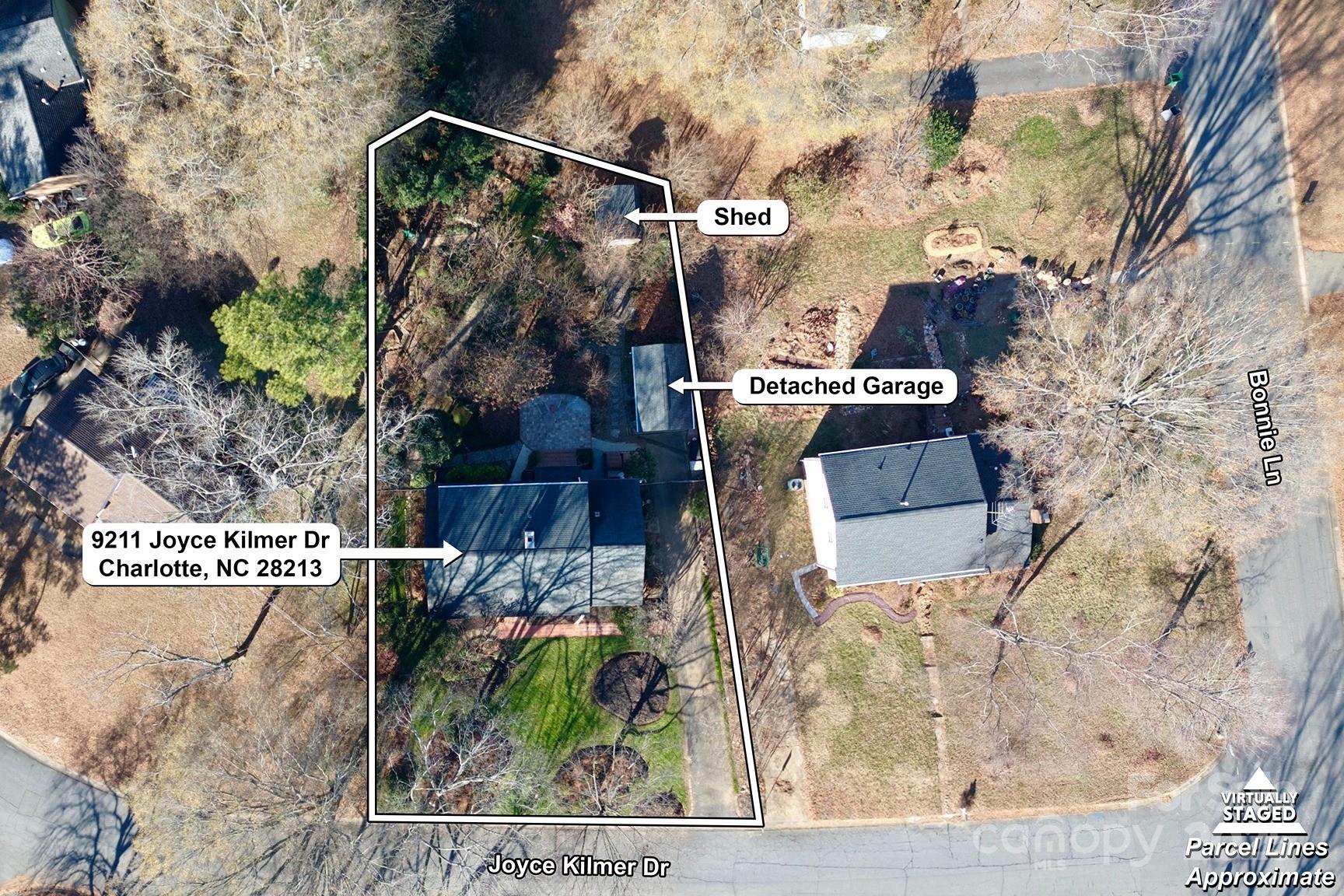 9211 Joyce Kilmer Drive Charlotte, NC 28213 - Photo 35 of 38 a view of a house with a yard and sitting area