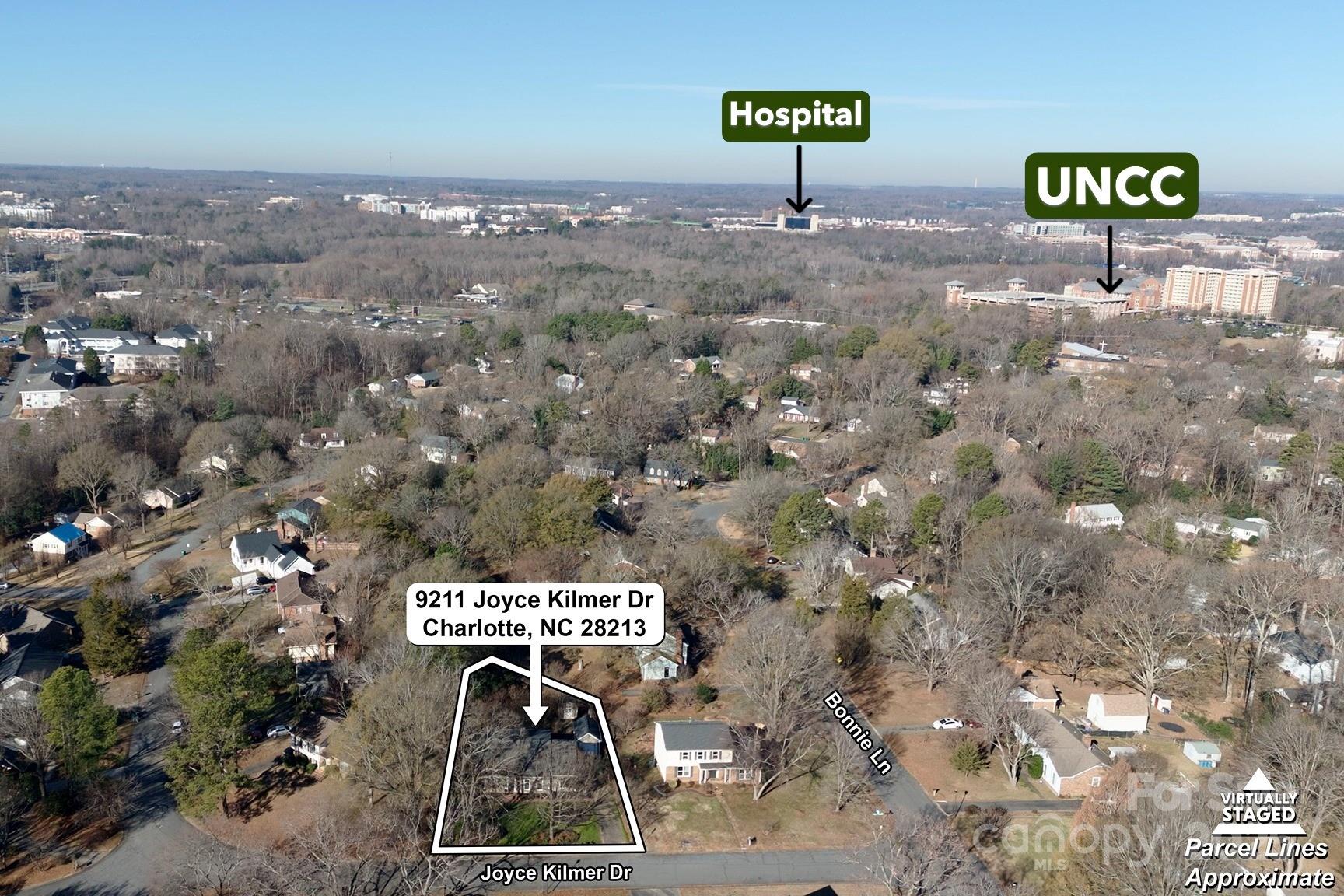 9211 Joyce Kilmer Drive Charlotte, NC 28213 - Photo 36 of 38 a sign that is sitting on a brick wall