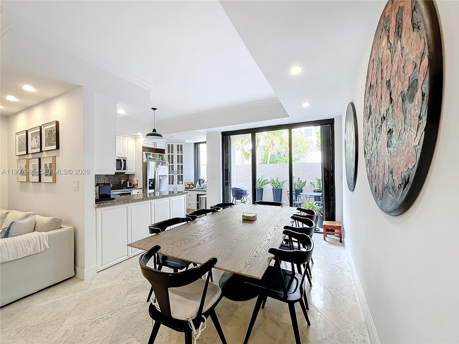 Key Colony Condominiums Key Biscayne, FL 33149 - Photo 6 of 29 a view of a dining room with furniture window and a livingroom
