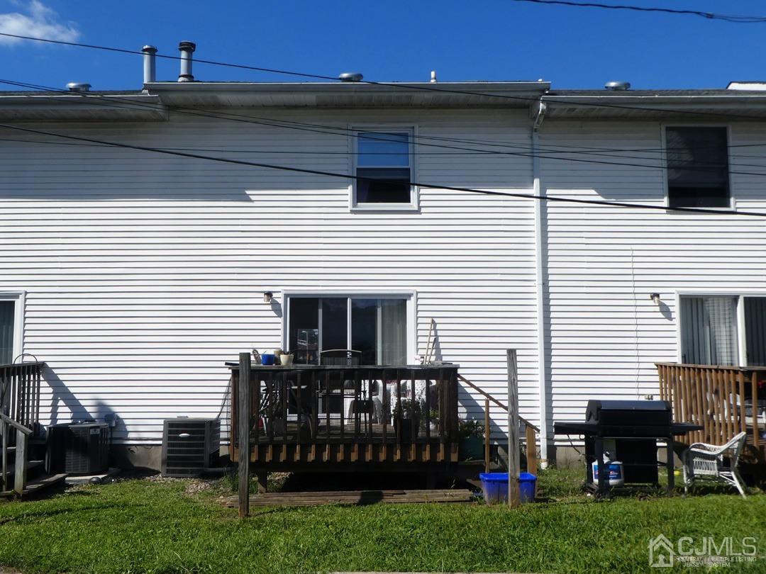 741 Bound Brook Road, Unit 3 Dunellen, NJ 08812 - Photo 14 of 14 a view of house with backyard and deck
