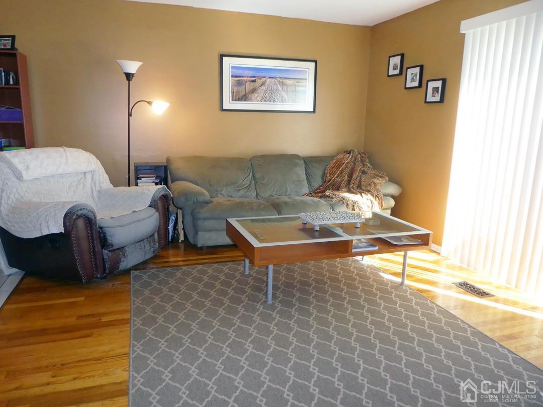 741 Bound Brook Road, Unit 3 Dunellen, NJ 08812 - Photo 5 of 14 a living room with couches and a coffee table