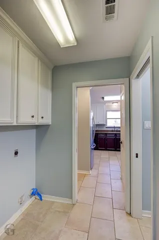 a view of kitchen and utility room