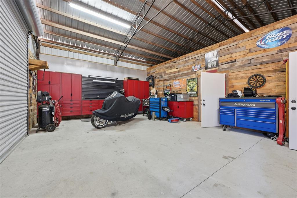 7119 Northeast 24th Loop High Springs, FL 32643 - Photo 26 of 35 a view of a storage room with furniture
