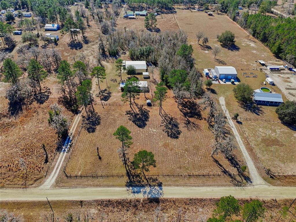 7119 Northeast 24th Loop High Springs, FL 32643 - Photo 33 of 35 an aerial view of a house with a yard