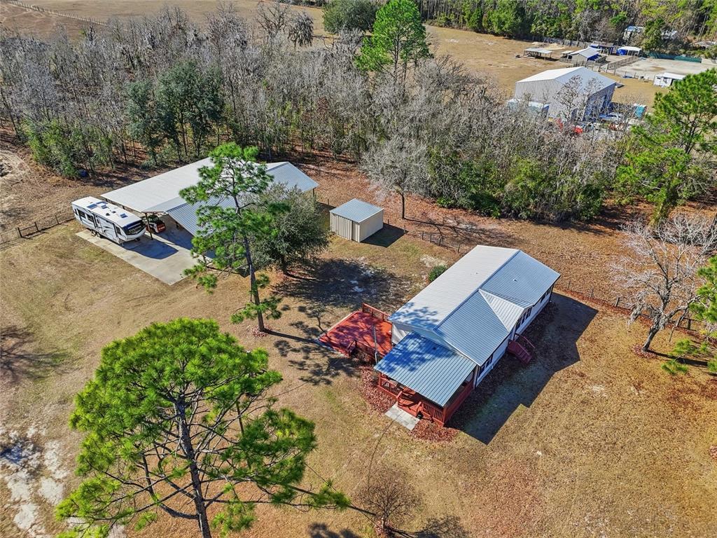 7119 Northeast 24th Loop High Springs, FL 32643 - Photo 35 of 35 an aerial view of a house with a yard