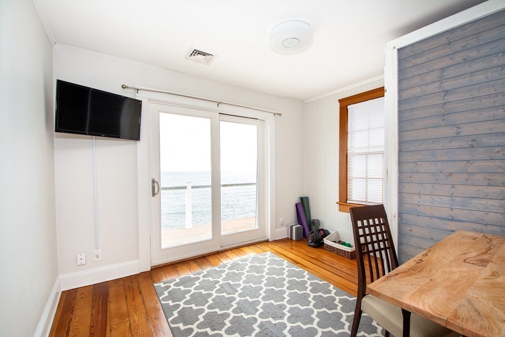 6 Oceanside Drive Scituate, MA 02066 - Photo 23 of 34 a bedroom with furniture and a window
