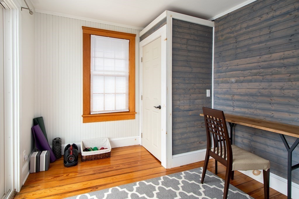 6 Oceanside Drive Scituate, MA 02066 - Photo 24 of 34 a bedroom with a chair and a window