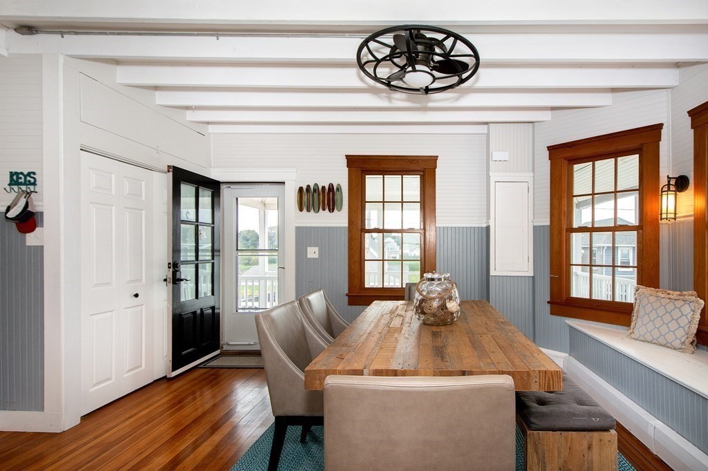 6 Oceanside Drive Scituate, MA 02066 - Photo 9 of 34 a view of a dining room with furniture window and wooden floor