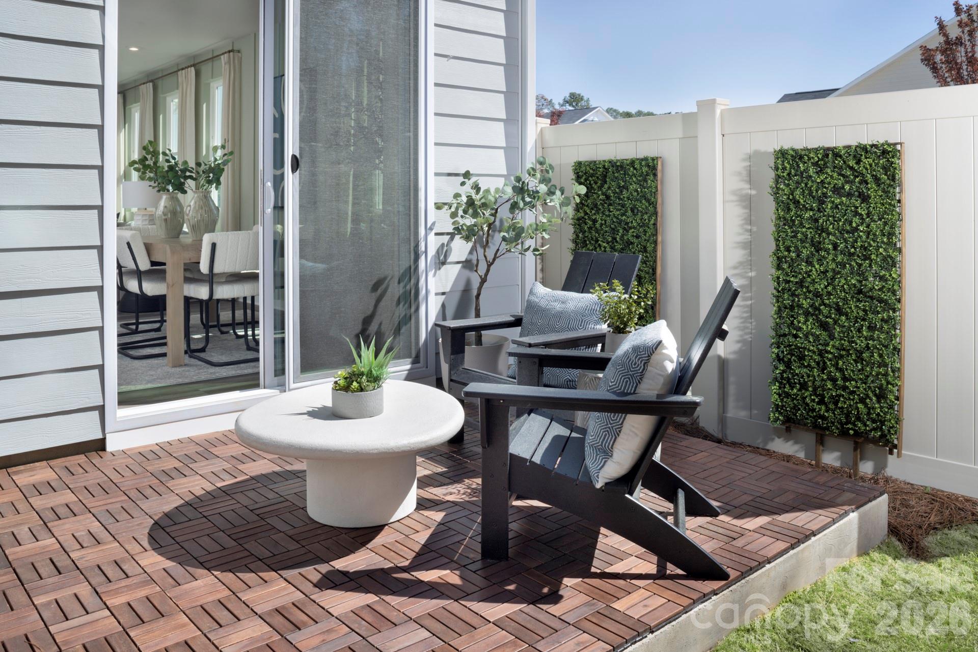 344 Laura Elizabeth Lane Clover, SC 29710 - Photo 16 of 19 a view of a balcony with chairs and a table
