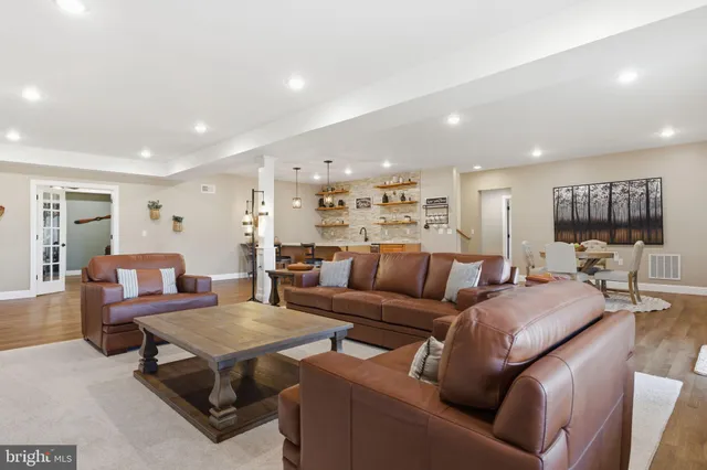 a view of a workspace with furniture and cabinet