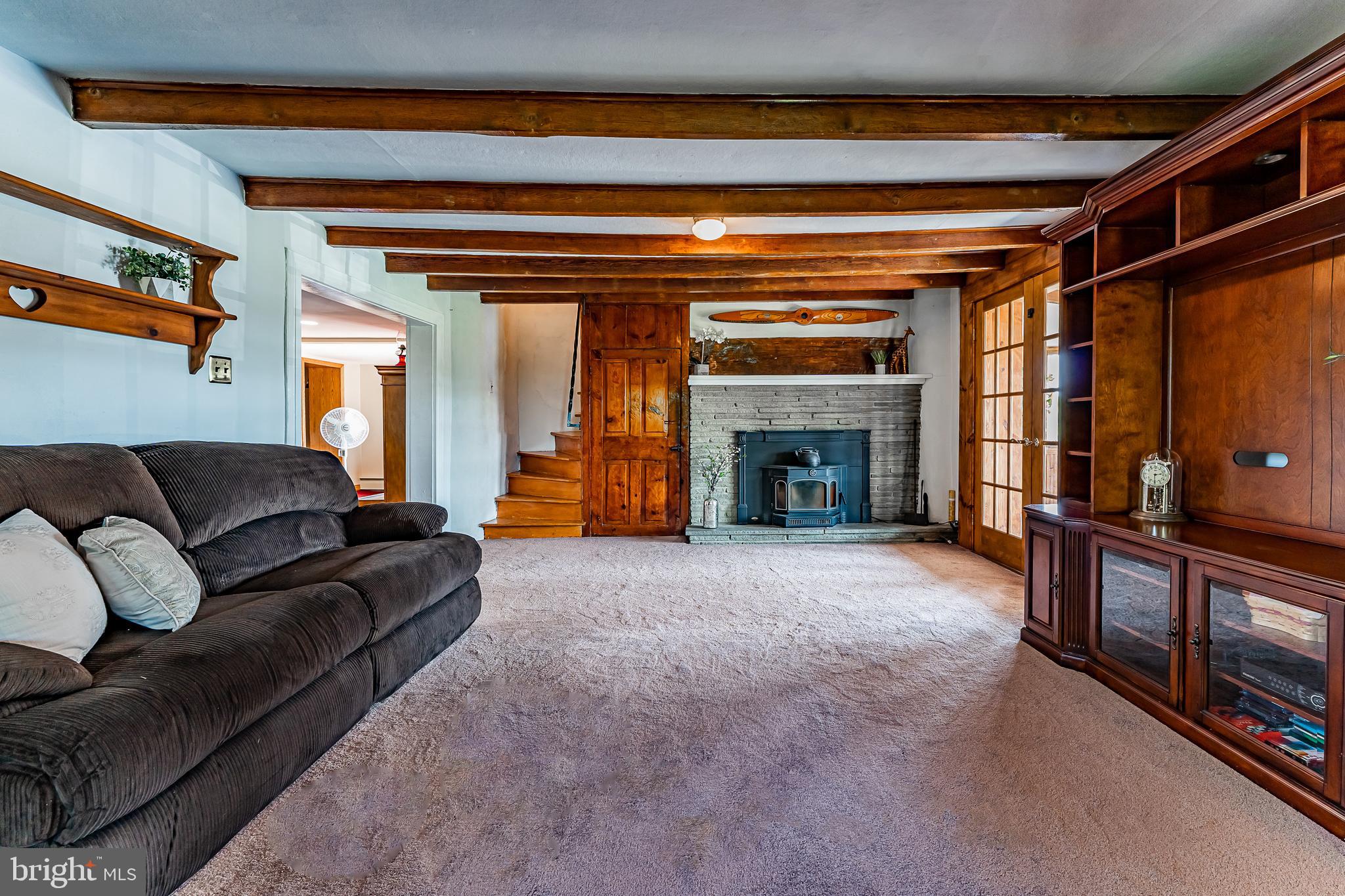 161 Meadow Road Quakertown, PA 18951 - Photo 5 of 50 Living Room w/stone fireplace stairs to 2nd floor