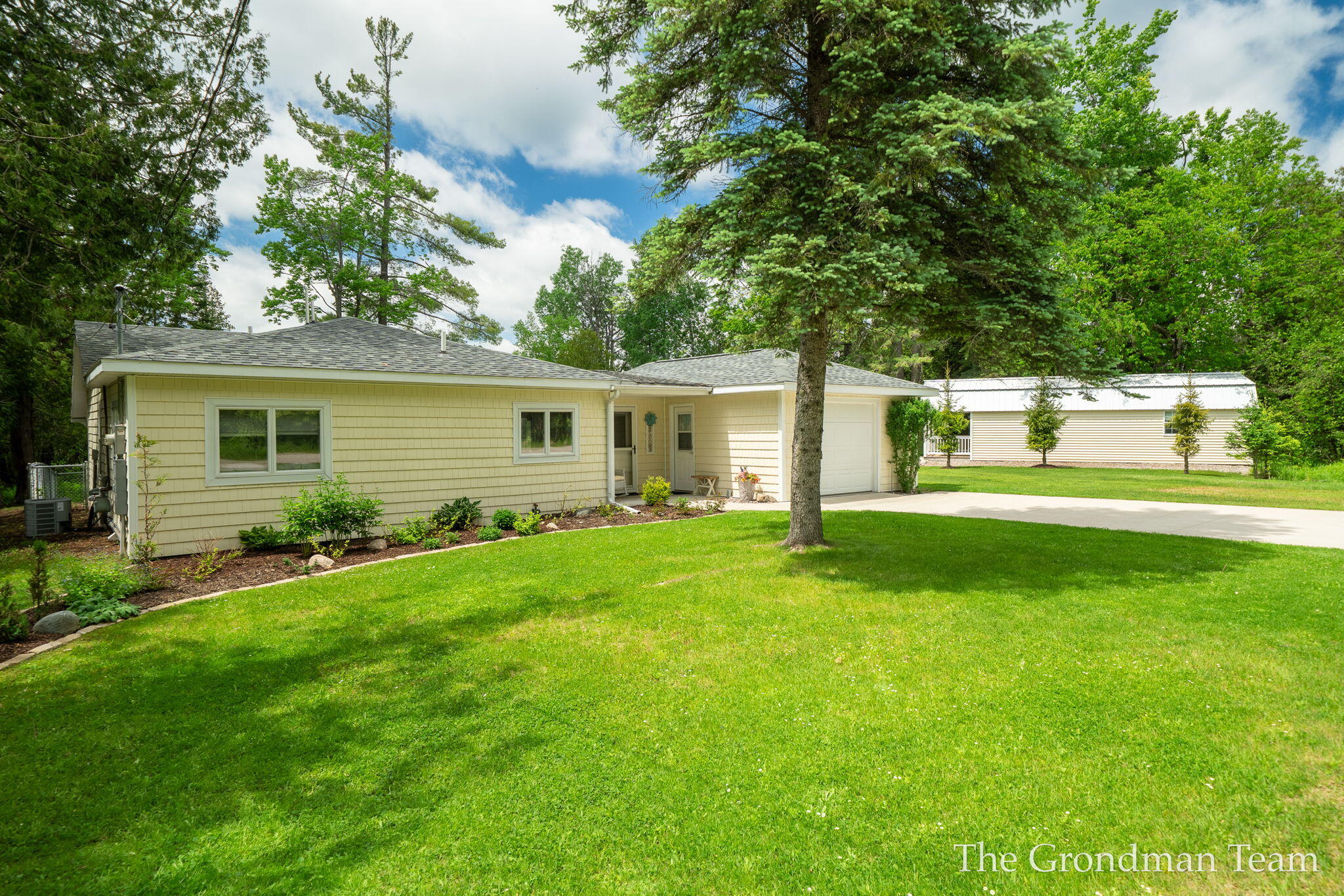 7170 Spring Street Alanson, MI 49706 - Photo 1 of 65 1-web-or-mls-7170 Spring St, Alanson, MI