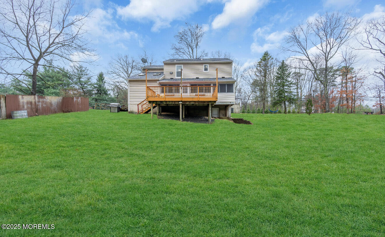 115 Leesville Road Jackson, NJ 08527 - Photo 2 of 15 a view of a big yard with large trees and a big yard