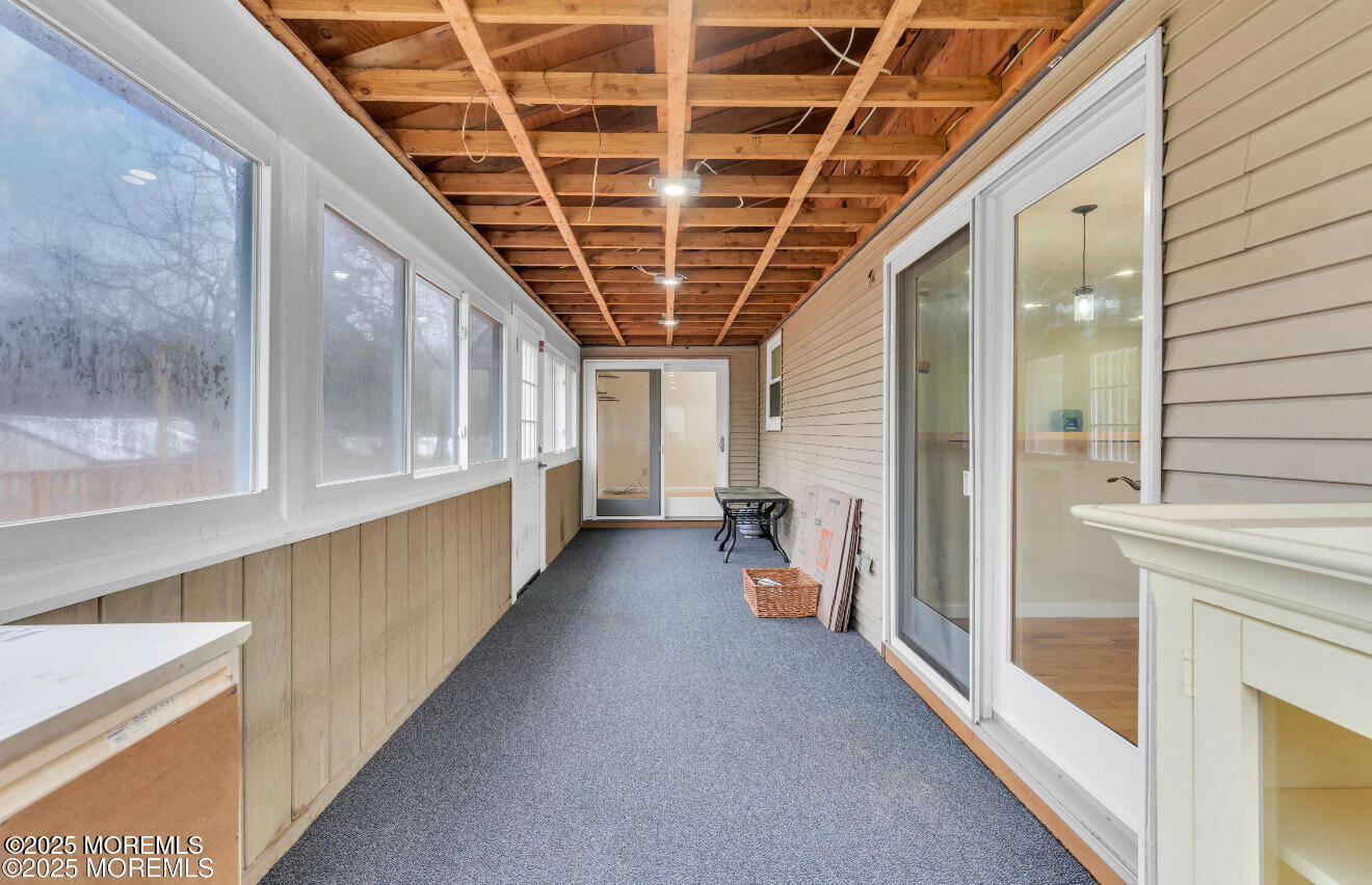 115 Leesville Road Jackson, NJ 08527 - Photo 7 of 15 a view of a large room with wooden floor and windows