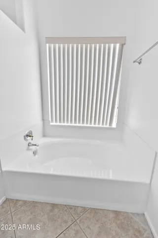 a bathroom with bathtub