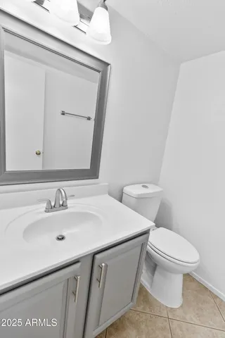 a view of a house with backyard and porch