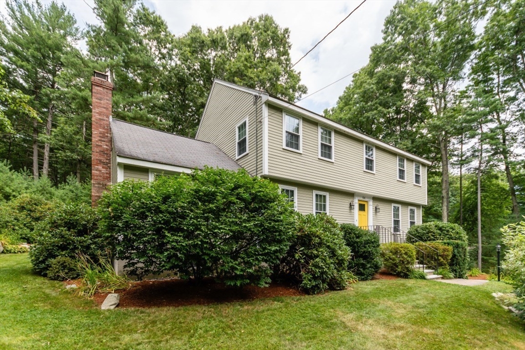 64 Wayside Inn Road Marlborough, MA 01752 - Photo 1 of 42 a house view with a garden space