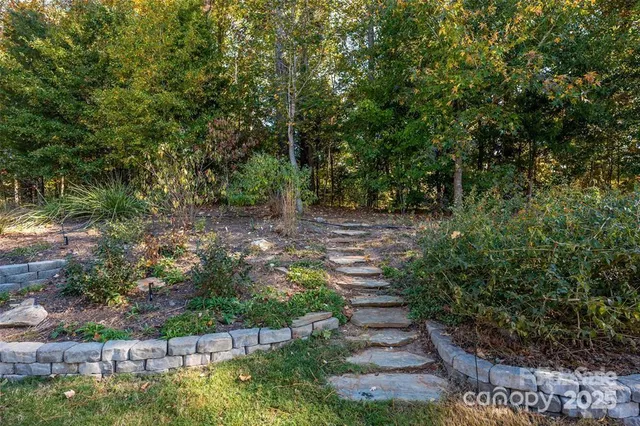 a view of backyard with green space
