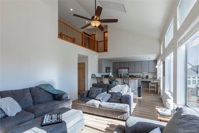 a bedroom with a bed and a desk