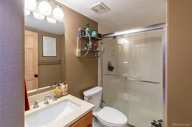 a view of storage and utility room with washer and dryer