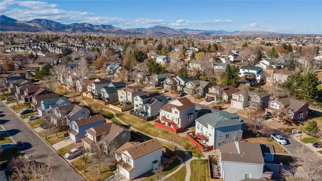 a aerial view of a house with a swimming pool