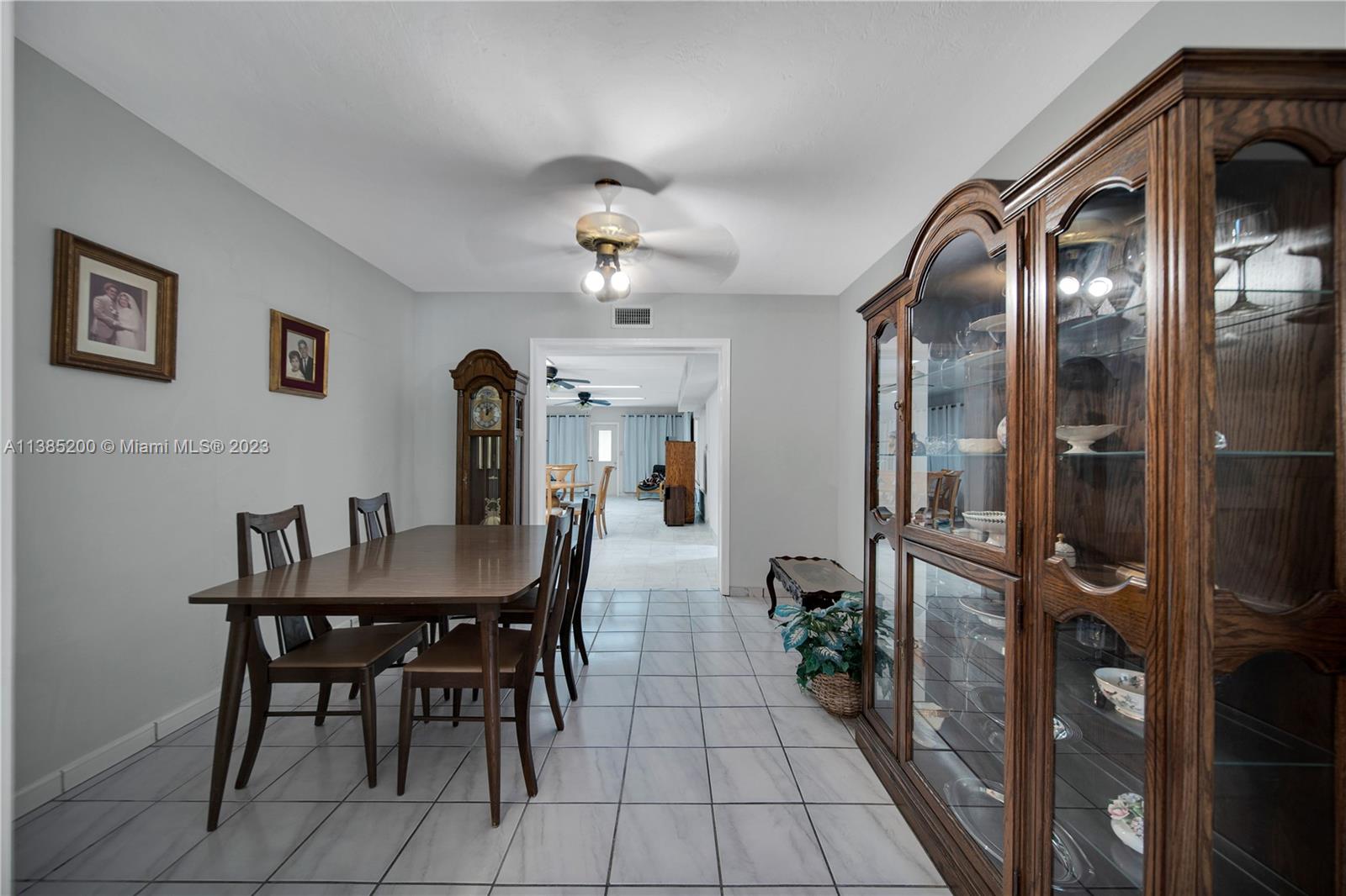 615 Southwest 21st Road Miami, FL 33129 - Photo 14 of 43 a view of a dining room with furniture