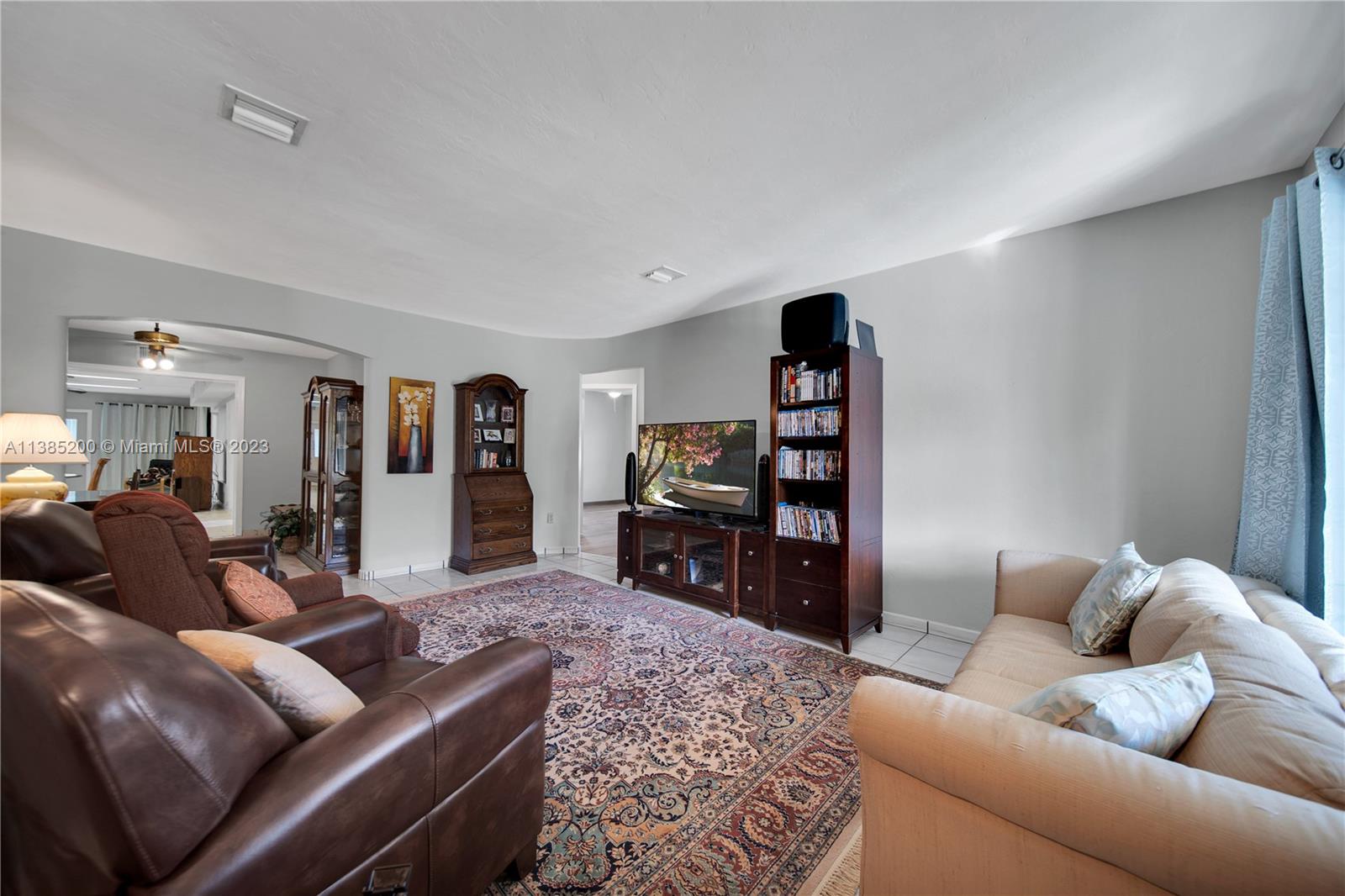 615 Southwest 21st Road Miami, FL 33129 - Photo 19 of 43 a living room with furniture and a couch