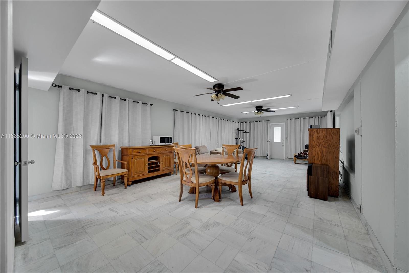 615 Southwest 21st Road Miami, FL 33129 - Photo 21 of 43 a living room with furniture