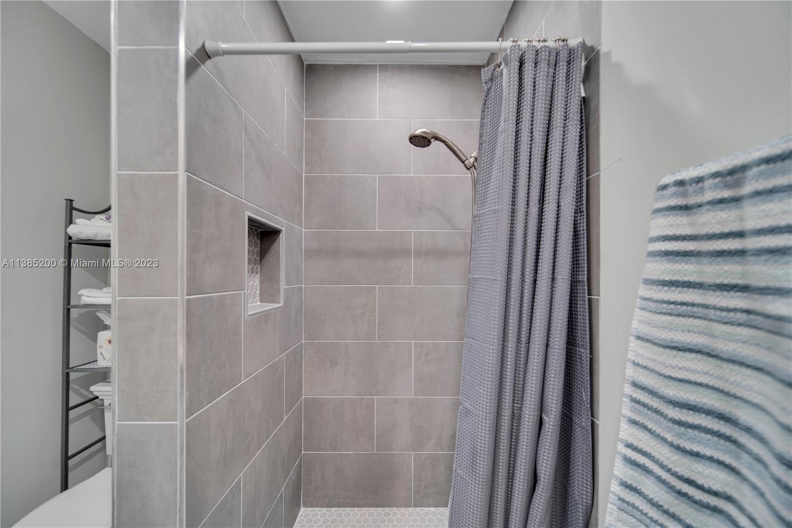 615 Southwest 21st Road Miami, FL 33129 - Photo 28 of 43 a bathroom with a shower