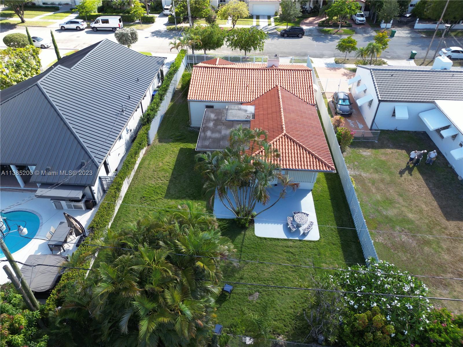 615 Southwest 21st Road Miami, FL 33129 - Photo 36 of 43 an aerial view of a house with a yard and lake view