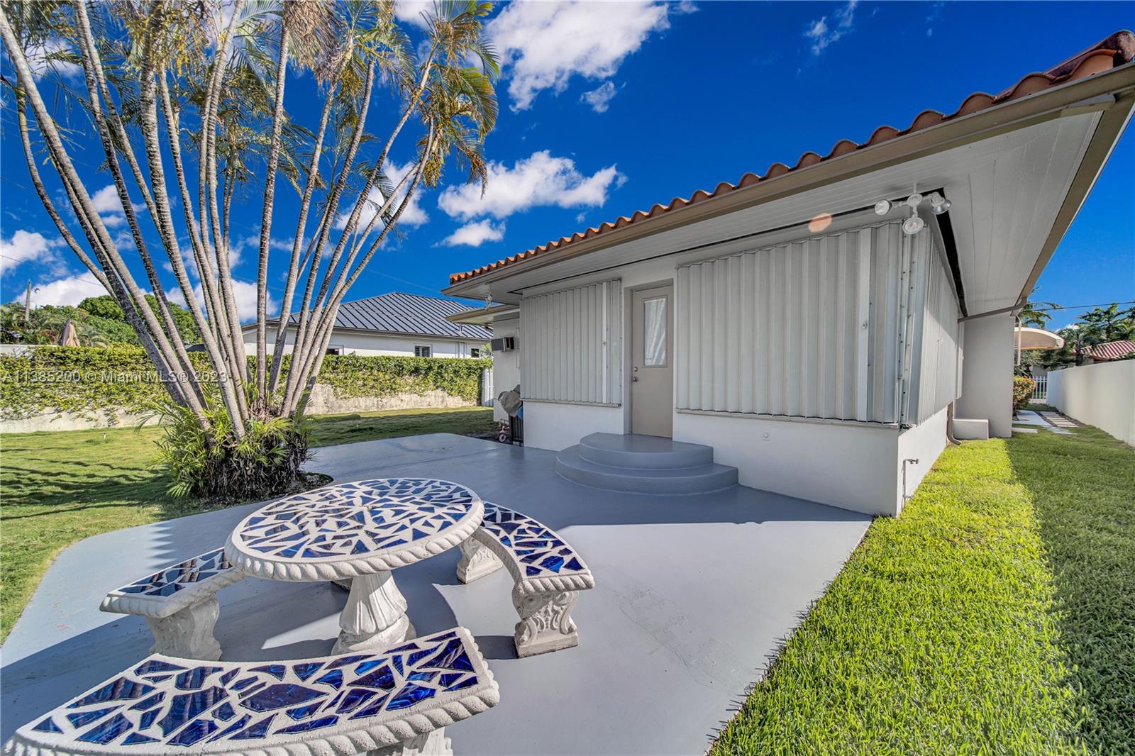 615 Southwest 21st Road Miami, FL 33129 - Photo 40 of 43 a front view of a house with garden